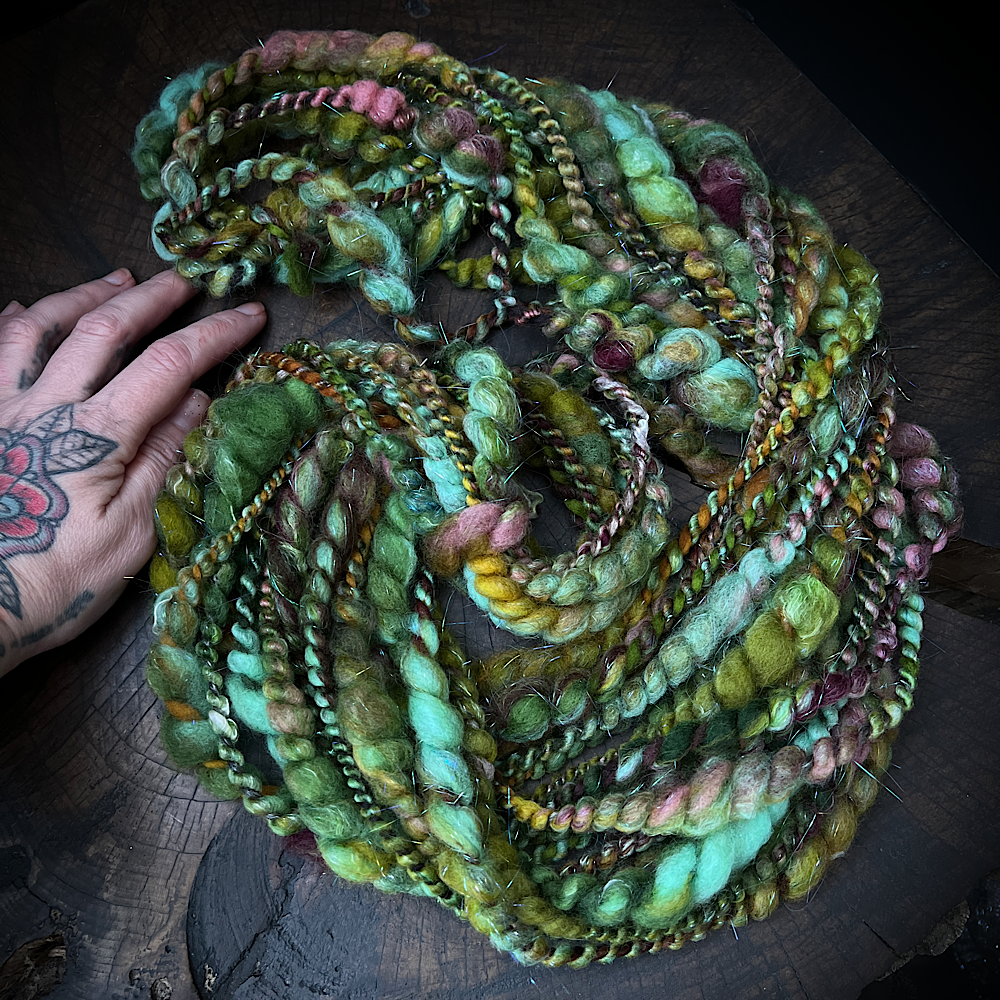 Fluffy spiral in mermaid green