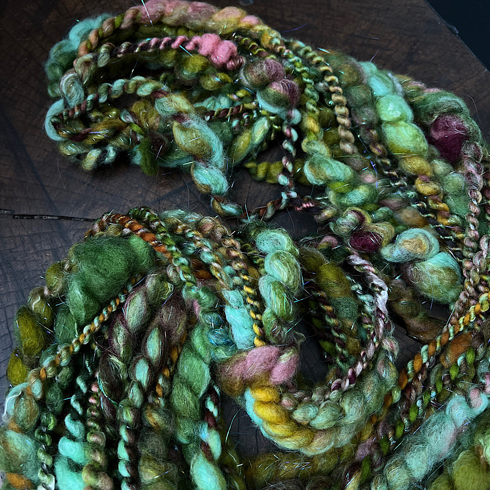 Fluffy spiral in mermaid green